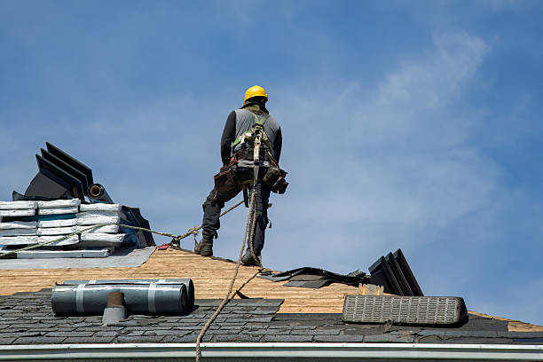 Professional Storm Damage Roof Repair technician working in Ashton, IA